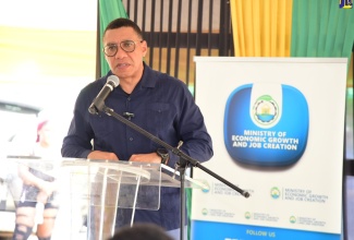 Prime Minister, Dr. the Most Hon. Andrew Holness, delivers the main address at the contract -and ground-breaking ceremony for the Spicy Grove Infrastructure Works Project in Oracabessa, St. Mary, on September 25.

