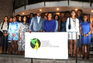 Jamaica’s Ambassador to the United States, Her Excellency Audrey P. Marks (seventh right) and Chairman of the Jamaica Howard University Affinity Network (JHUAN), Don Christian (eighth right), share a moment with the 2023 recipients of the JHUAN scholarship award.

