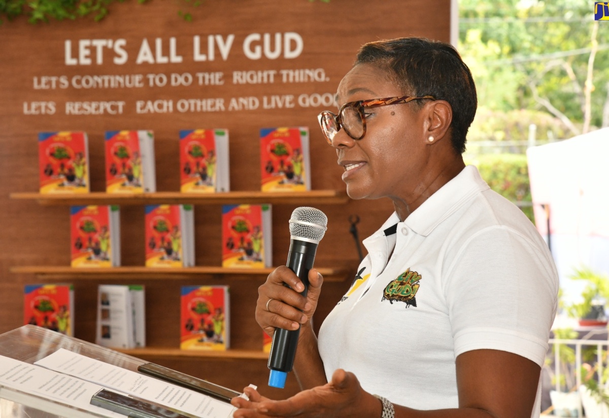 Minister of State in the Ministry of National Security, Hon. Juliet Cuthbert-Flynn, speaking at the launch of the ‘Let’s All Liv Gud’ activity book at Curphey Place in Kingston in May 2024.

