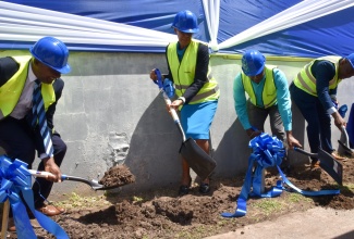 Education and Youth Minister, Hon. Fayval Williams (second left)  participates in the ground-breaking exercise for the construction of the Overseas Examinations Commission's (OEC’s) new state-of-the-art multipurpose facility at the Commission's Manhattan Road location in Kingston on Wednesday (September 18). She is joined by (from left) Executive Director of the OEC, Hector Stephenson; Mayor of Kingston Division, Councillor Andrew Swaby; and Chairman of the OEC, Brian Bennett-Easy.

