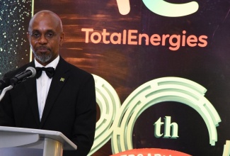 Chief Technical Director in the Ministry of Science, Energy, Telecommunications and Transport, Brian Richardson, delivers a speech on behalf of portfolio Minister, Hon. Daryl Vaz, at TotalEnergies Marketing Jamaica’s 20th Anniversary Gala, held recently at the AC Mariott Hotel in New Kingston.

