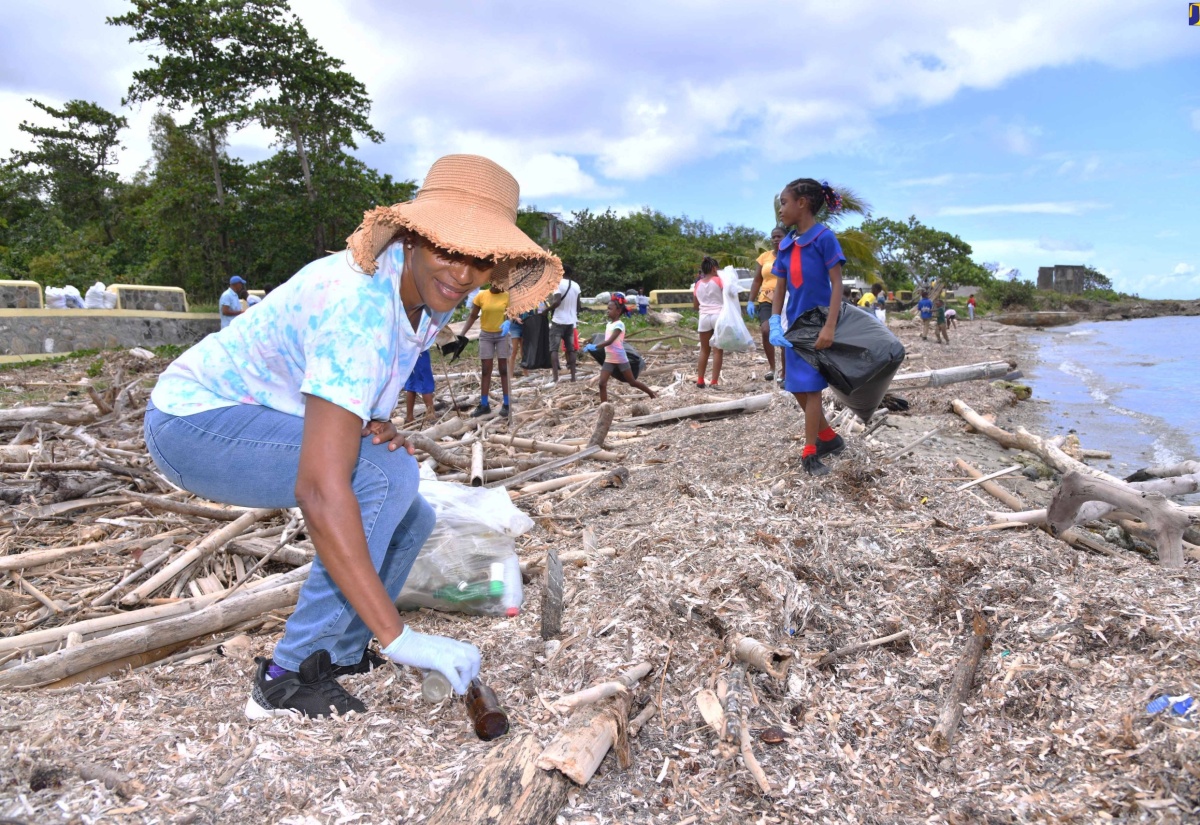 Teacher at Robin’s Bay Primary School in St. Mary, Judith Stubbs, participates in a clean-up of Robin’s Bay Beach on September 12.