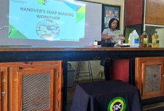 Owner of a Local Economic Initiative (LEI) in St. James, Dorceen Jennings, leads the Social Development Commission’s (SDC) soapmaking workshop, staged recently at Rusea’s High School in Hanover.

