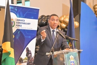 Prime Minister, the Most Hon. Andrew Holness, emphasies a point while addressing the retirement function for Deputy Commissioner of Police (DCP), Fitz Bailey, held recently at the AC Mariott Hotel in New Kingston.

