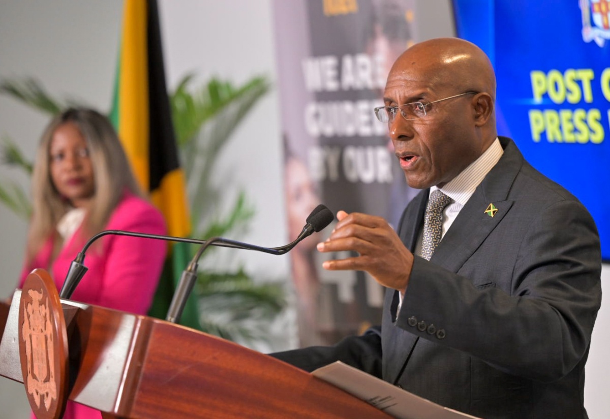 Minister of Industry, Investment and Commerce, Senator the Hon. Aubyn Hill, addressing Wednesday’s (September 18) post-Cabinet press briefing at the corporate office of business processing outsourcing firm iTel, in St. Andrew. Listening is Minister without Portfolio in the Office of the Prime Minister, with Responsibility for Information, Skills and Digital Transformation, Senator Dr. the Hon. Dana Morris Dixon.

