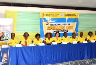 Minister of Labour and Social Security, Hon. Pearnel Charles Jr. (left) addresses participants in the 20th National Senior Citizens’ Spelling Bee Competition held at the Jamaica Pegasus Hotel in New Kingston on September 25.

