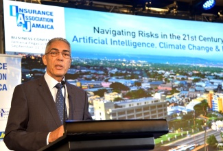 Bank of Jamaica (BOJ) Governor, Richard Byles, addresses the inaugural Insurance Association of Jamaica (IAJ) business conference at The Jamaica Pegasus hotel in New Kingston on Wednesday (September 11).