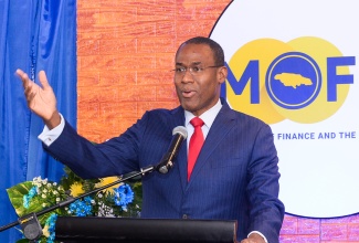 Minister of Finance and the Public Service, Dr. the Hon. Nigel Clarke, delivers remarks during the launch of the Financial Sector Adjustment Company (FINSAC) Archives at The Jamaica Pegasus hotel in New Kingston on Thursday (October 17).

